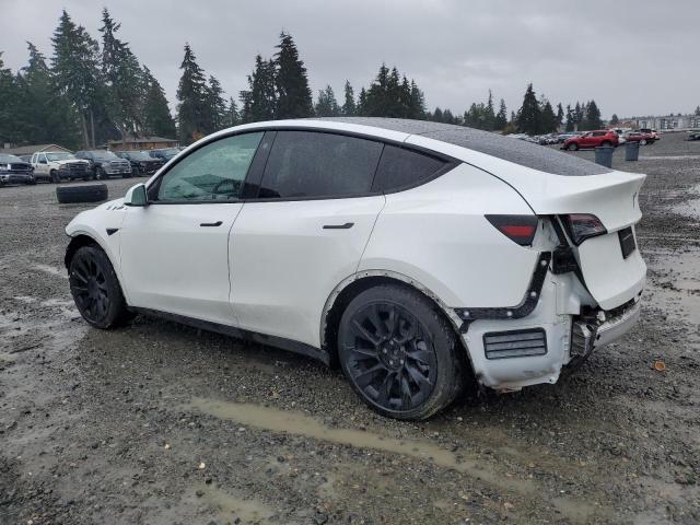 Photo 2 from auction – 2021 TESLA MODEL Y with VIN 5YJYGAEE4MF142836