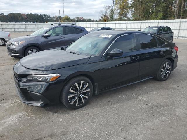HONDA CIVIC EX 2023 with VIN 2HGFE1F77PH314113 - Photo from auction