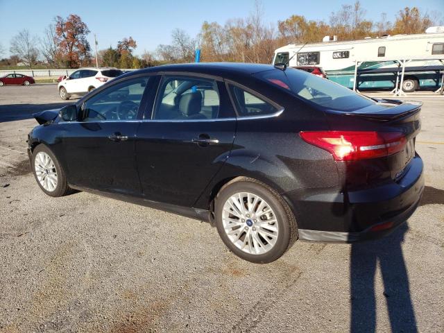 Photo 2 from auction – 2015 FORD FOCUS TITA with VIN 1FADP3J29FL299998