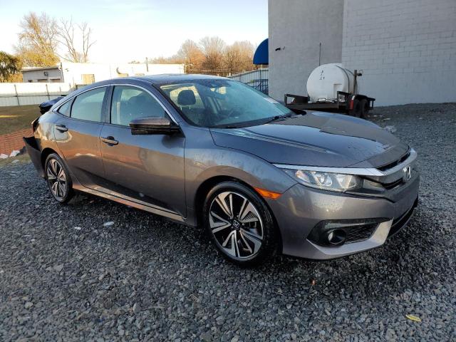 Photo 4 from auction – 2018 HONDA CIVIC EX with VIN JHMFC1F42JX030951