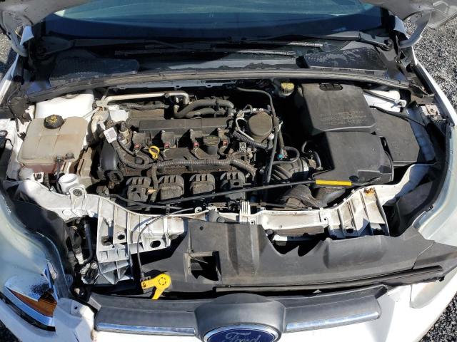 Photo 11 from auction – 2014 FORD FOCUS SE with VIN 1FADP3F2XEL227179