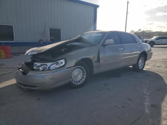 LINCOLN TOWN CAR E 1999 with VIN 1LNHM81W2XY648228 - Photo from auction
