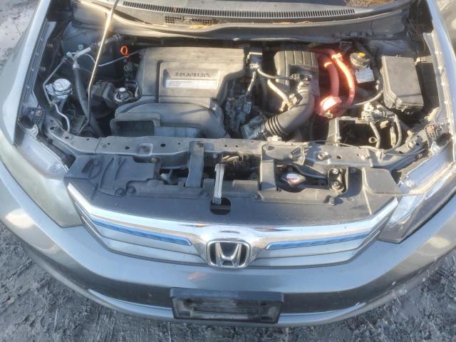 Photo 11 from auction – 2012 HONDA CIVIC HYBR with VIN JHMFB4F21CS005610