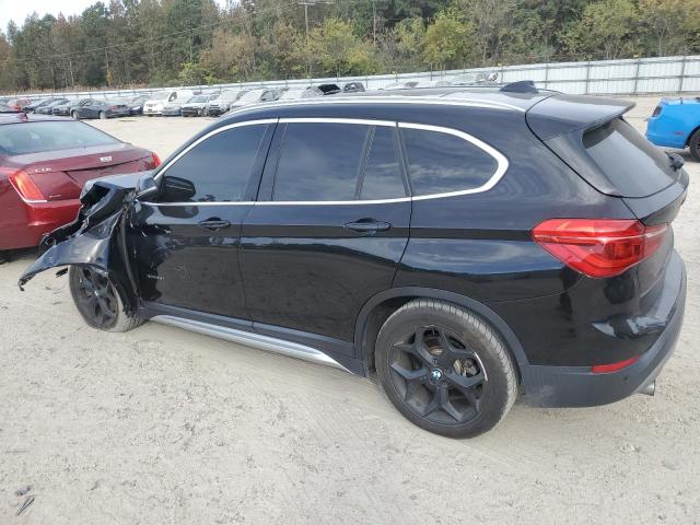 Photo 2 from auction – 2016 BMW X1 XDRIVE2 with VIN WBXHT3C33G5F64682