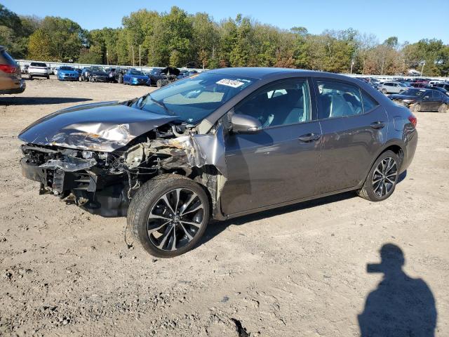 TOYOTA COROLLA L 2018 with VIN 5YFBURHE5JP814136 - Photo from auction
