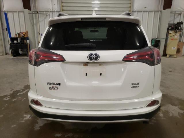 Photo 6 from auction – 2016 TOYOTA RAV4 XLE with VIN JTMRFREV8GJ101189