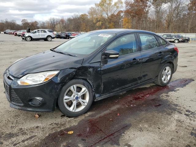 FORD FOCUS SE 2014 with VIN 1FADP3F28EL228413 - Photo from auction