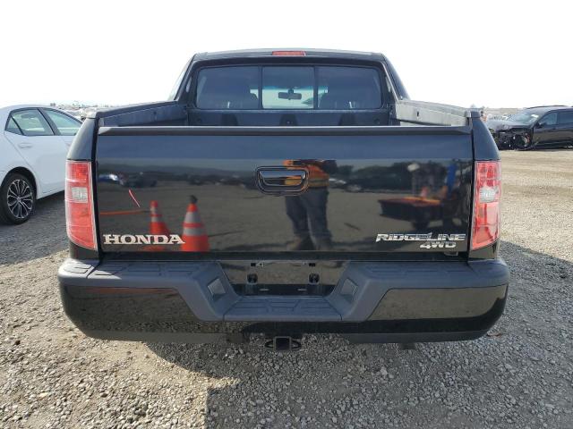 Photo 6 from auction – 2010 HONDA RIDGELINE with VIN 5FPYK1F55AB011950
