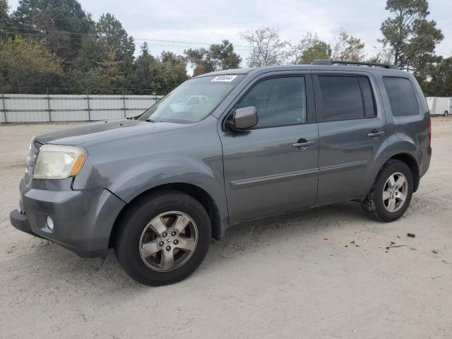 HONDA PILOT EXLN 2011 with VIN 5FNYF4H7XBB090689 - Photo from auction
