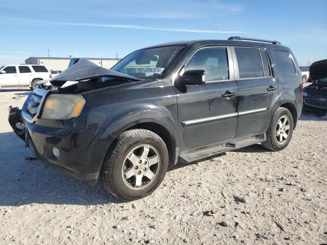 Фото 1 с аукциона – 2011 HONDA PILOT TOUR с VIN 5FNYF3H94BB044559