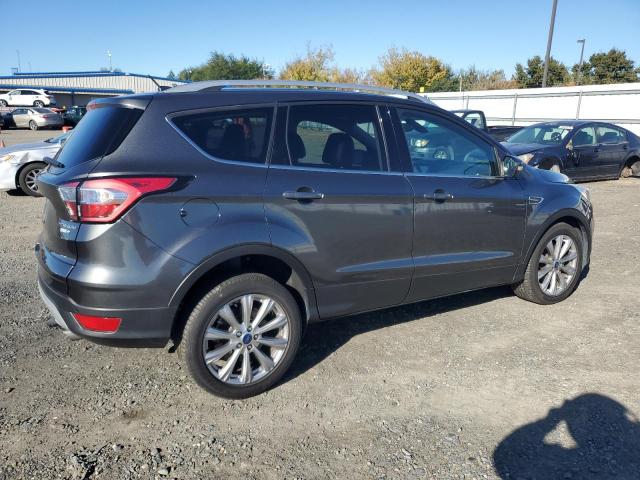 Photo 3 from auction – 2017 FORD ESCAPE TIT with VIN 1FMCU9J99HUD77333