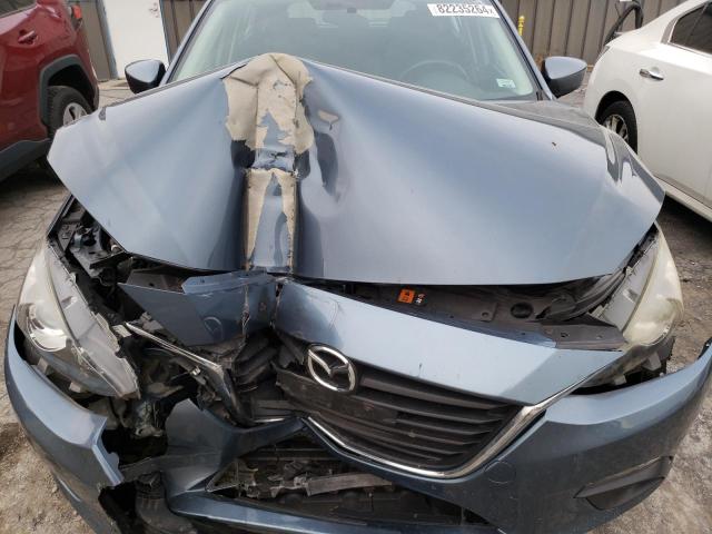 Photo 11 from auction – 2014 MAZDA 3 TOURING with VIN JM1BM1L74E1206015