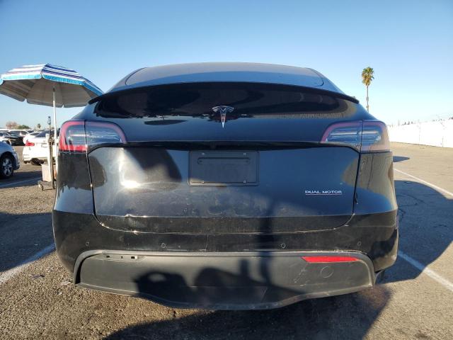 Photo 6 from auction – 2022 TESLA MODEL Y with VIN 7SAYGDEF2NF554039