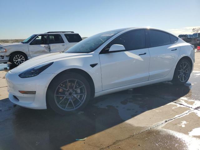 TESLA MODEL 3 2021 with VIN 5YJ3E1EA7MF046566 - Photo from auction