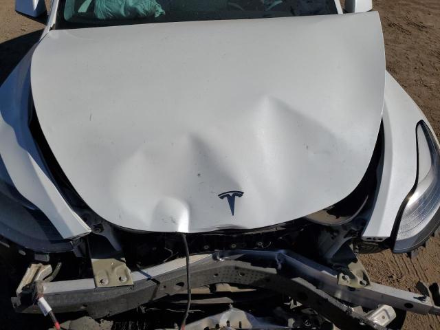 Photo 11 from auction – 2023 TESLA MODEL Y with VIN 7SAYGAEEXPF744308