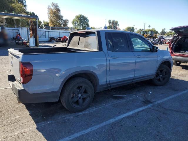 Photo 3 from auction – 2022 HONDA RIDGELINE with VIN 5FPYK3F82NB024005