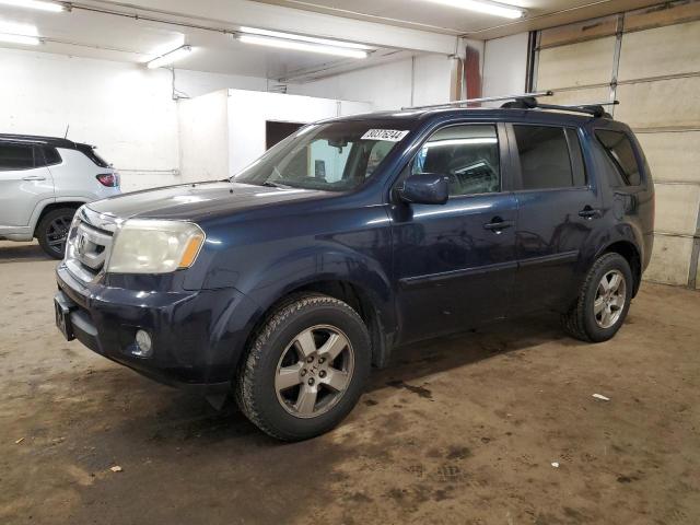 HONDA PILOT EXL 2011 with VIN 5FNYF4H64BB077444 - Photo from auction