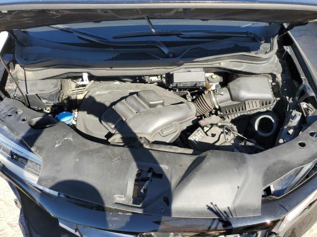 Photo 12 from auction – 2021 HONDA PASSPORT E with VIN 5FNYF8H08MB035431