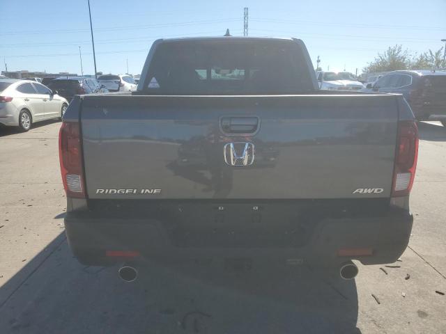 Photo 6 from auction – 2023 HONDA RIDGELINE with VIN 5FPYK3F79PB053088