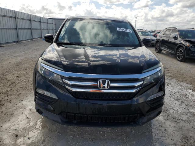 Photo 5 from auction – 2018 HONDA PILOT LX with VIN 5FNYF5H18JB032712