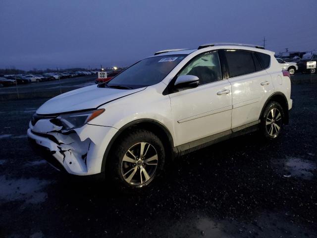 TOYOTA RAV4 XLE 2016 with VIN 2T3RFREV8GW472130 - Photo from auction