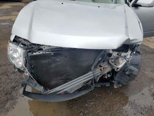 Photo 11 from auction – 2010 FORD ESCAPE LIM with VIN 1FMCU0E74AKA29252