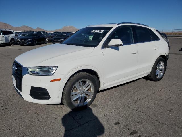 AUDI Q3 PREMIUM 2016 with VIN WA1EFCFS5GR024440 - Photo from auction