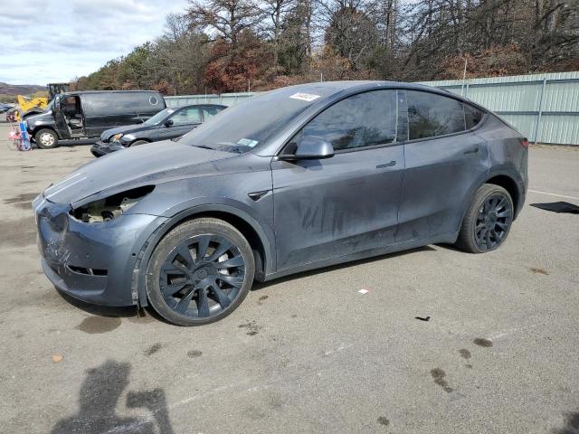 TESLA MODEL Y 2022 z numerem VIN 7SAYGDEE0NF450432 - Zdjęcie z aukcji