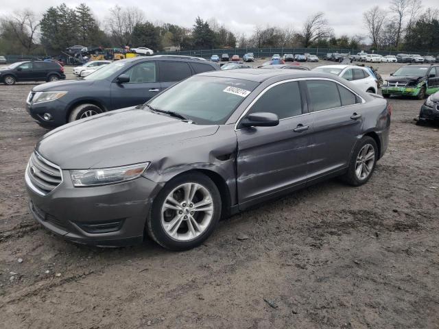 FORD TAURUS SEL 2014 with VIN 1FAHP2E84EG143398 - Photo from auction