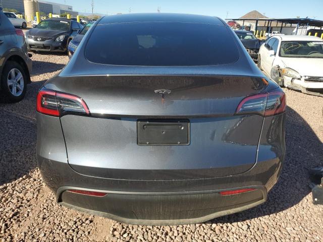 Photo 6 from auction – 2023 TESLA MODEL Y with VIN 7SAYGDED3PF962602