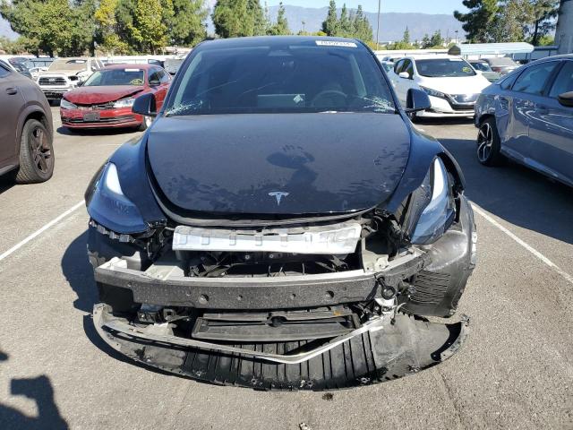Photo 5 from auction – 2023 TESLA MODEL Y with VIN 7SAYGDEF8PF642581