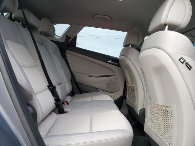 Photo 11 from auction – 2018 HYUNDAI TUCSON SEL with VIN KM8J3CA45JU660748