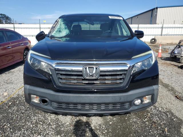Photo 5 from auction – 2017 HONDA RIDGELINE with VIN 5FPYK3F65HB018749