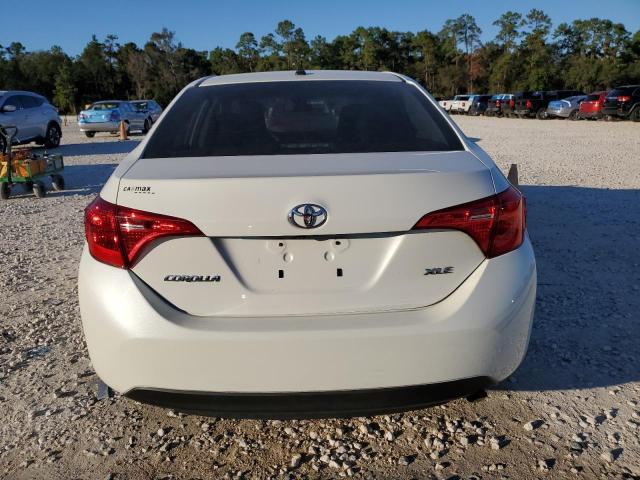Photo 6 from auction – 2018 TOYOTA COROLLA L with VIN 5YFBURHE7JP774190