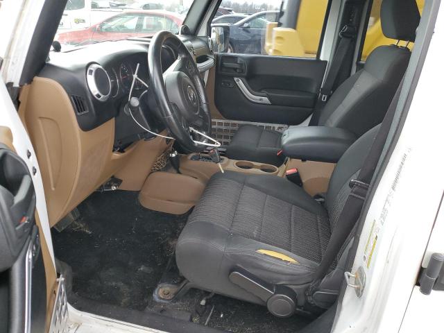 Photo 7 from auction – 2011 JEEP WRANGLER U with VIN 1J4BA5H15BL543260