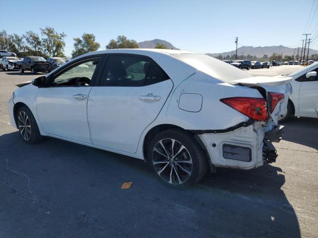 Photo 2 from auction – 2018 TOYOTA COROLLA L with VIN 5YFBURHE7JP791510