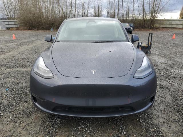 Photo 5 from auction – 2023 TESLA MODEL Y with VIN 7SAYGDED1PF966034