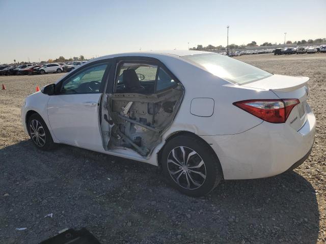 Photo 2 from auction – 2014 TOYOTA COROLLA L with VIN 5YFBURHE1EP140069