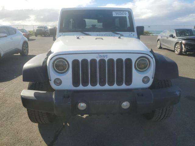 Photo 5 from auction – 2014 JEEP WRANGLER U with VIN 1C4HJWDG4EL257730