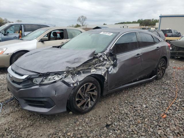 HONDA CIVIC EX 2018 with VIN 19XFC2F71JE034121 - Photo from auction