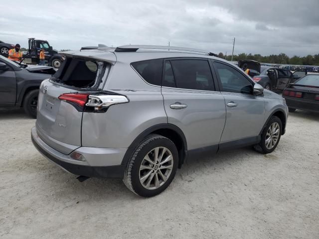 Photo 3 from auction – 2018 TOYOTA RAV4 LIMIT with VIN 2T3YFREV0JW471007