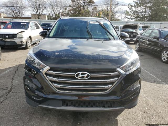 Photo 5 from auction – 2016 HYUNDAI TUCSON LIM with VIN KM8J33A22GU122516
