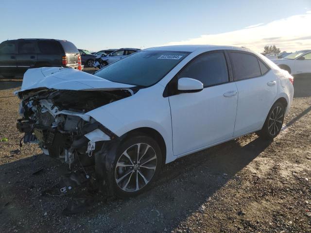 TOYOTA COROLLA L 2019 with VIN 5YFBURHEXKP868906 - Photo from auction