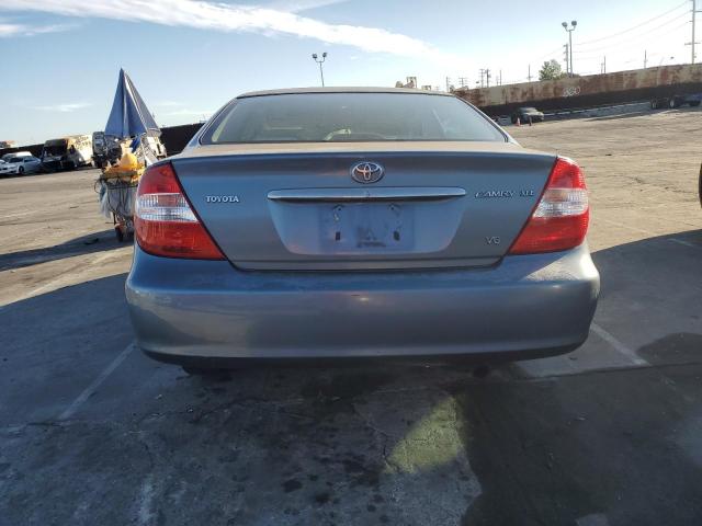 Photo 6 from auction – 2004 TOYOTA CAMRY LE with VIN 4T1BF32KX4U579449