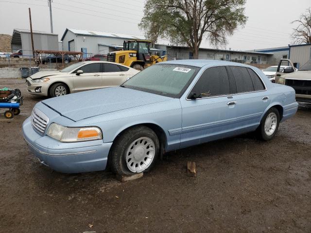 FORD CROWN VICT 2000 with VIN 2FAFP74W1YX147038 - Photo from auction