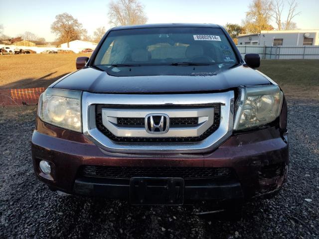 Photo 5 from auction – 2011 HONDA PILOT EX with VIN 5FNYF4H49BB051565