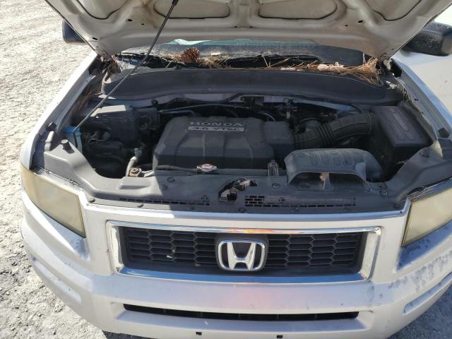 Photo 11 from auction – 2007 HONDA RIDGELINE with VIN 2HJYK16337H538813