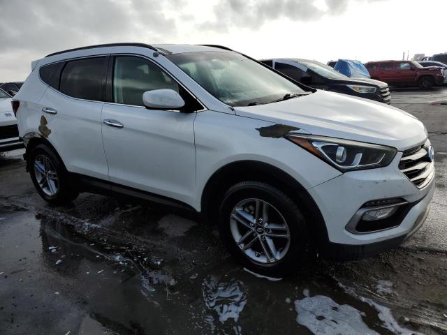 Photo 4 from auction – 2017 HYUNDAI SANTA FE S with VIN 5NMZU3LB0HH010002