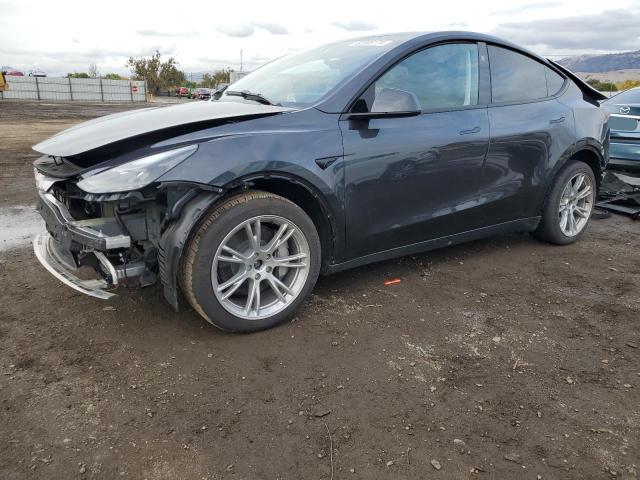 TESLA MODEL Y 2024 with VIN 7SAYGAEE6RF037595 - Photo from auction