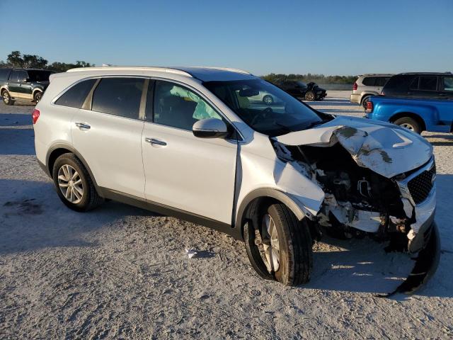 Photo 4 from auction – 2016 KIA SORENTO LX with VIN 5XYPG4A32GG104617